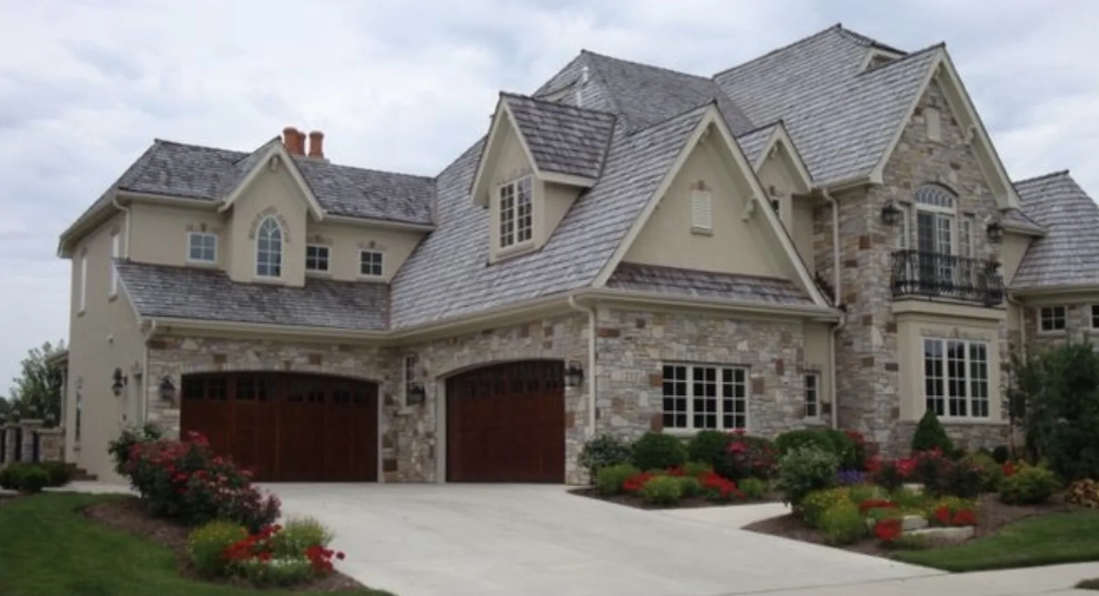 Stone house with multiple roof slopes